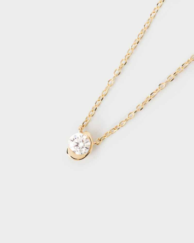 Dainty 18K yellow gold solitary necklace with a half-bezel set lab-grown diamond