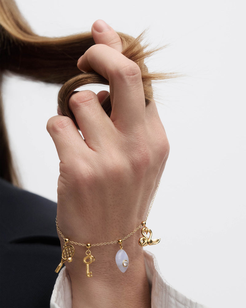 Tennis charm - 
  
    Sterling Silver / 18K Gold plating
  
