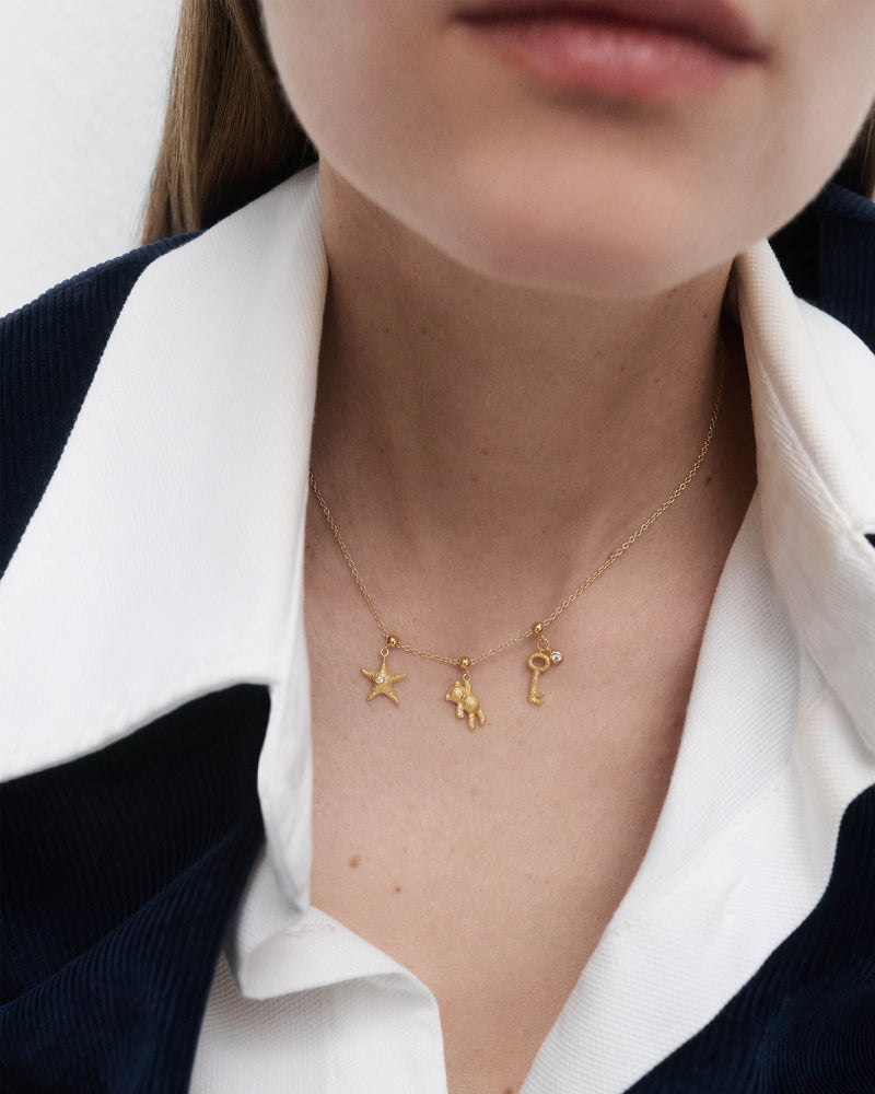 Key charm - 
  
    Sterling Silver / 18K Gold plating
  
