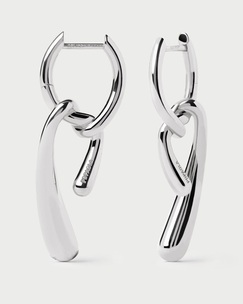 Silver asymmetric hoop earrings with fluid knotted pendants