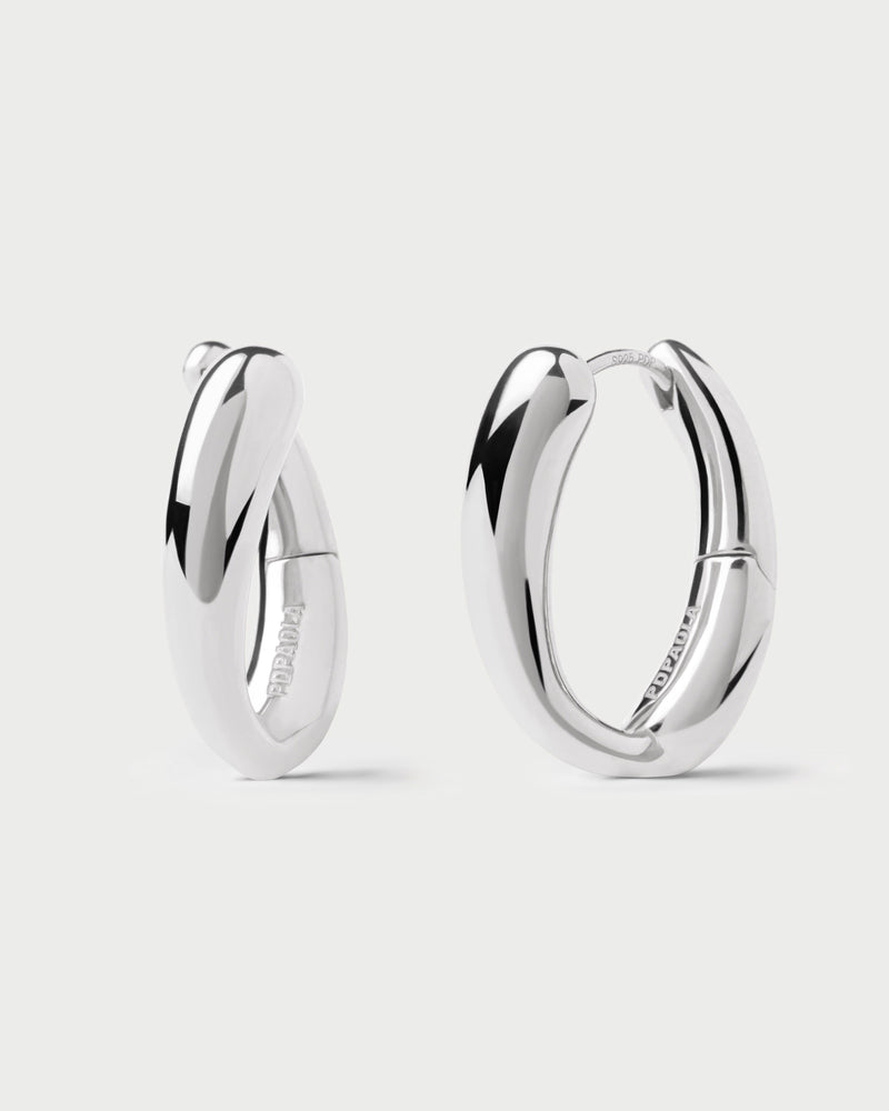 Silver modern hoop earrings with twisted design
