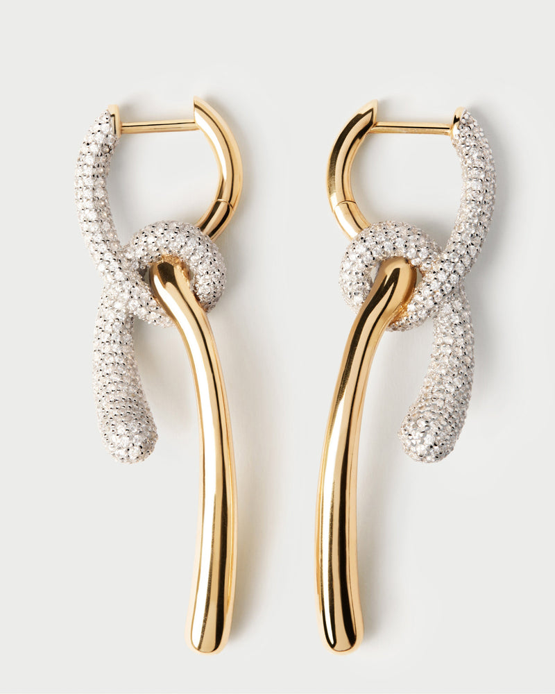 Elegant asymmetric hoop earrings with contrasting pavé zirconia knotted pendants