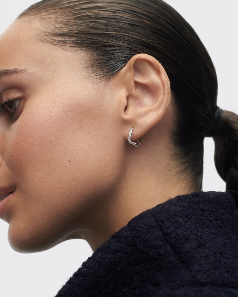 Diamonds and white gold Flow hoops - 
  
    18K White gold / Rhodium silver plating
  
