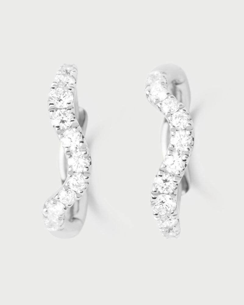 Diamonds and white gold Flow hoops - 
  
    18K White gold / Rhodium silver plating
  
