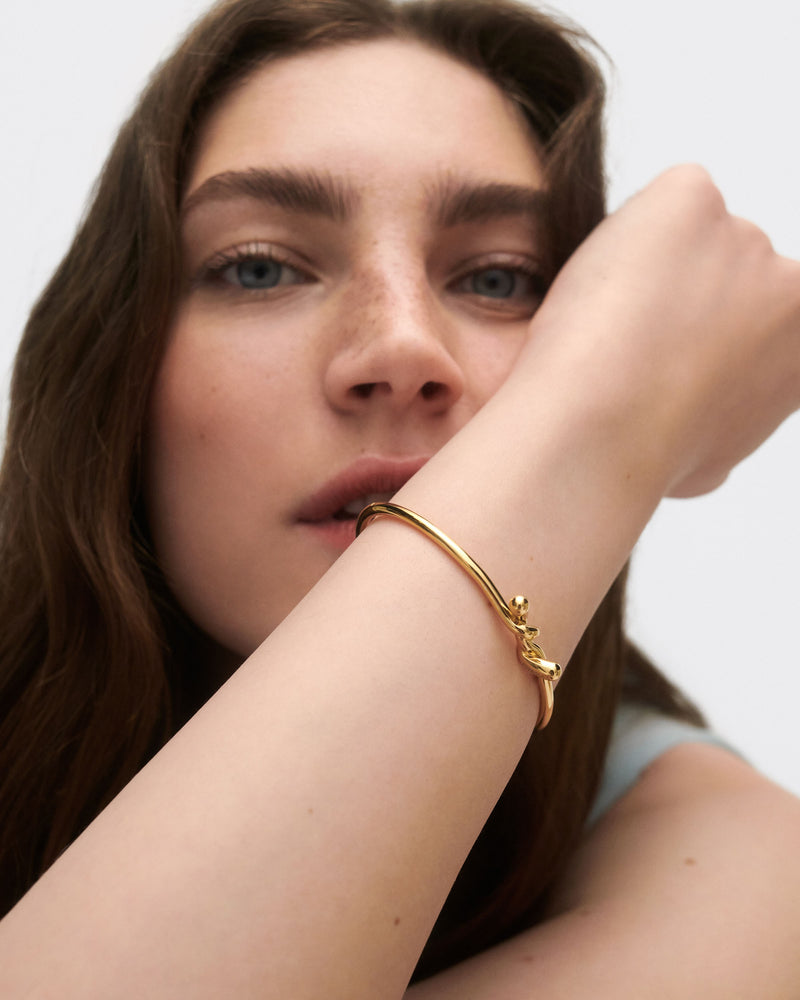Twist bangle - 
  
    Sterling Silver / 18K Gold plating
  
