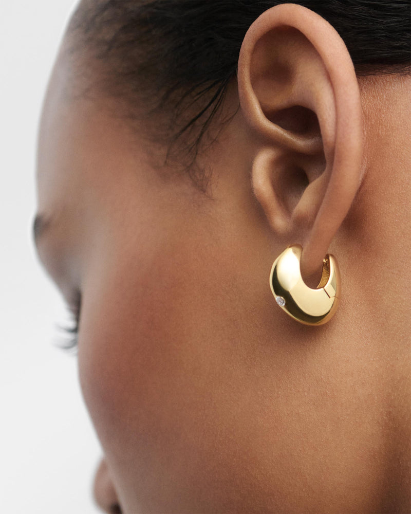 Wave hoops - 
  
    Sterling Silver / 18K Gold plating
  
