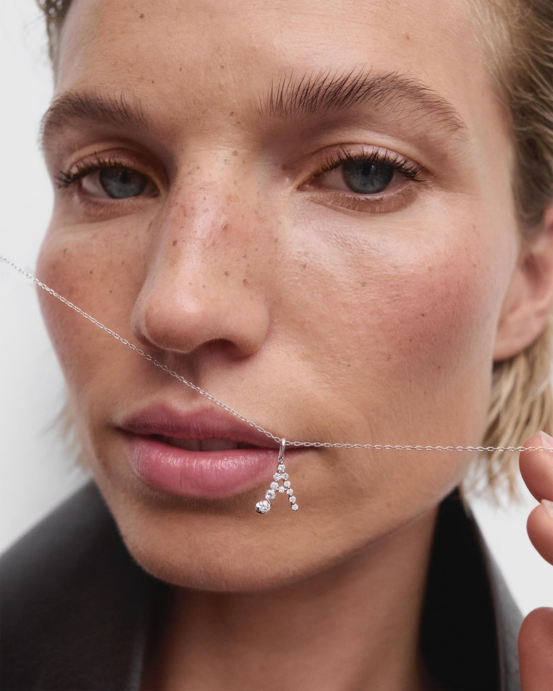 Diamonds and white gold A initial pendant - 
  
    18K White gold / Rhodium silver plating
  
