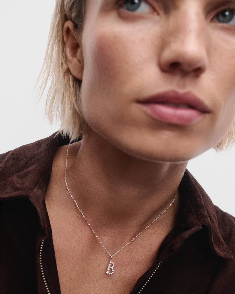 Diamonds and white gold B initial pendant - 
  
    18K White gold / Rhodium silver plating
  
