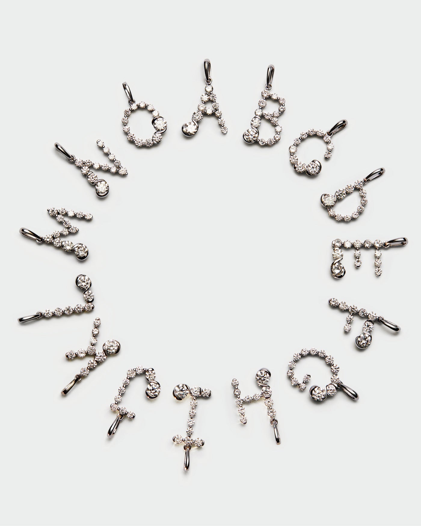 Diamonds and white gold S initial pendant - 
  
    18K White gold / Rhodium silver plating
  
