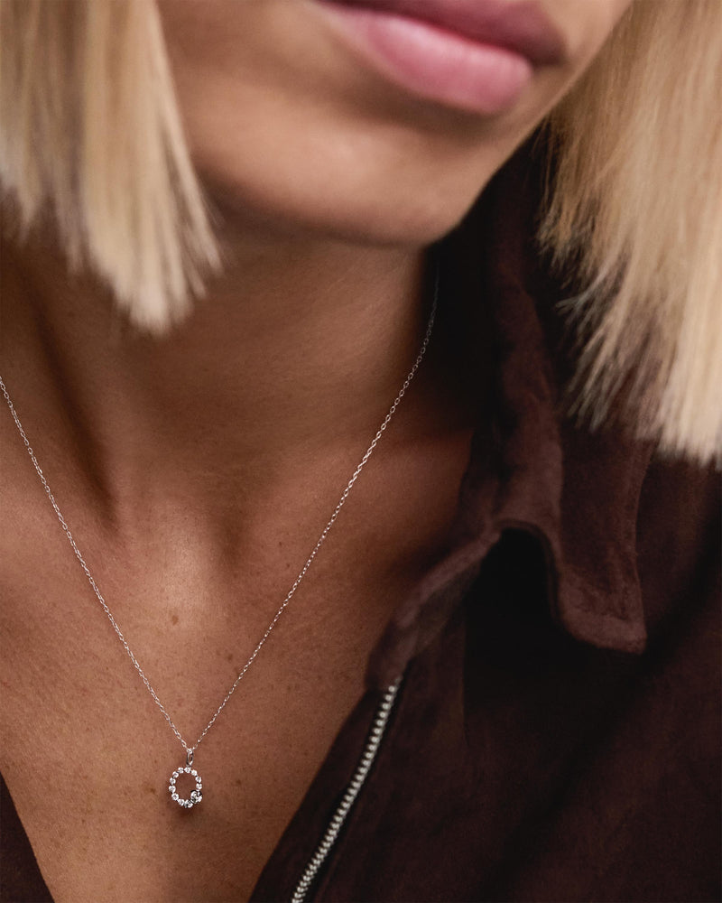 Diamonds and white gold O initial pendant - 
  
    18K White gold / Rhodium silver plating
  
