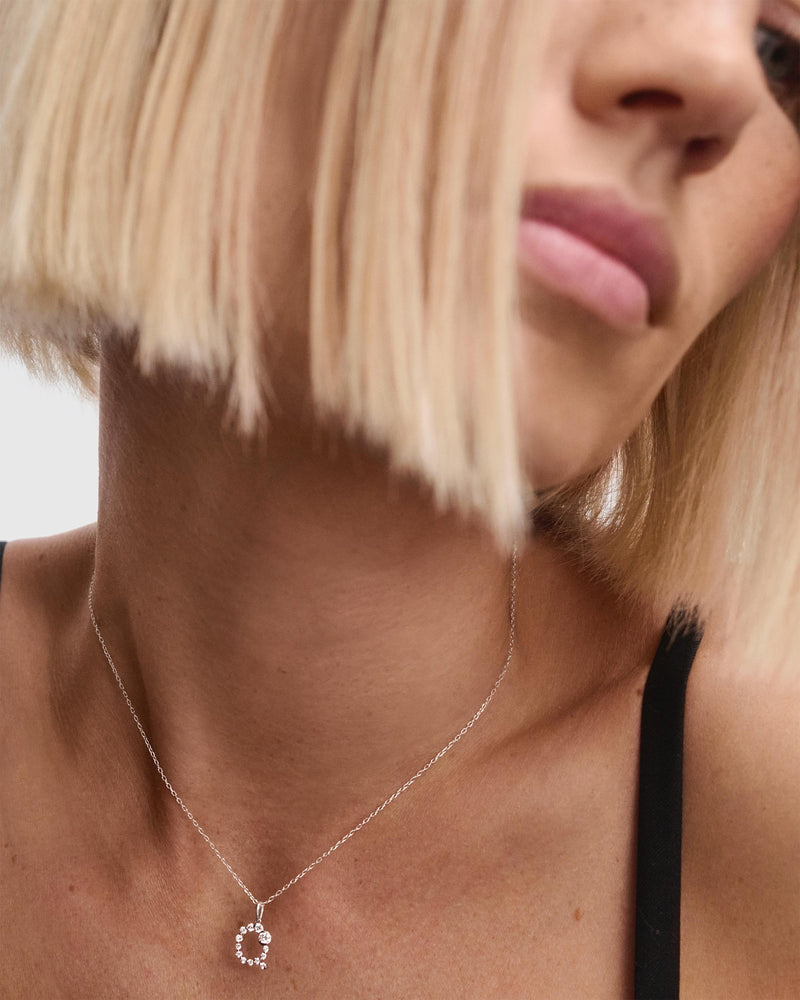 Diamonds and white gold Q initial pendant - 
  
    18K White gold / Rhodium silver plating
  
