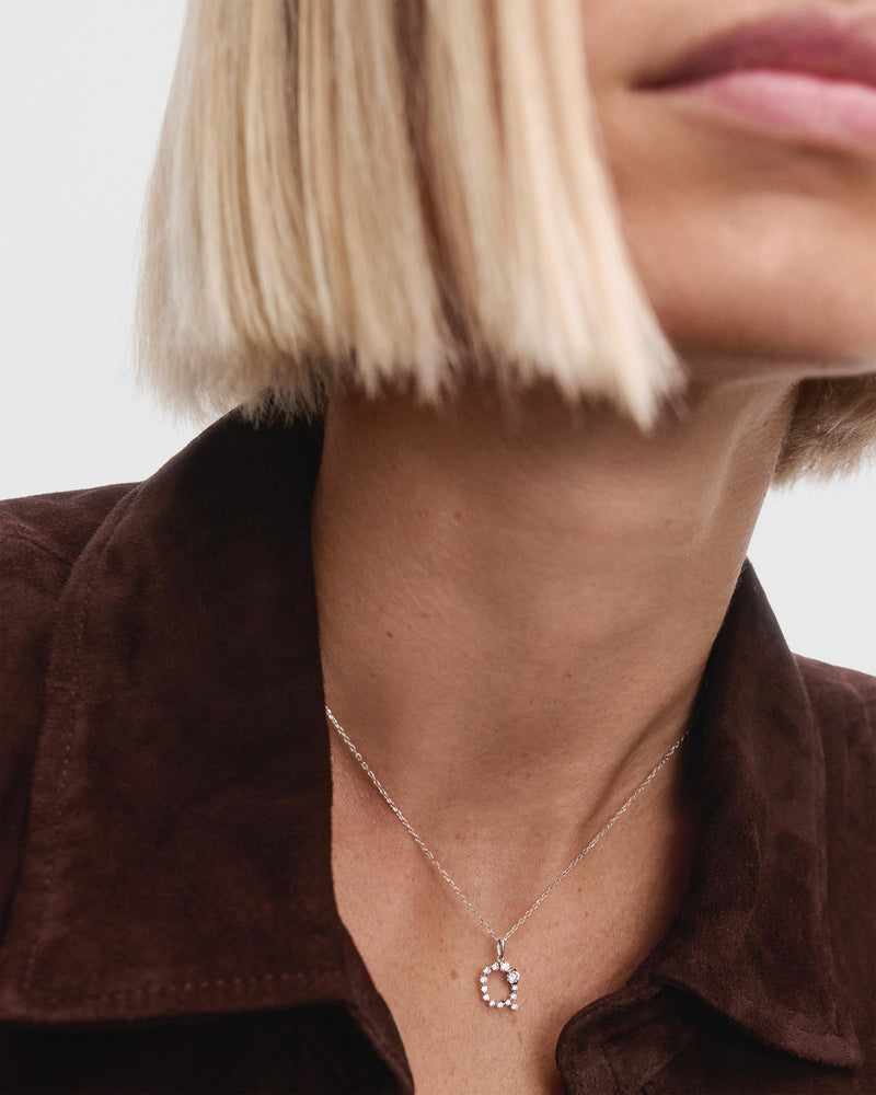 Diamonds and white gold Q initial pendant - 
  
    18K White gold / Rhodium silver plating
  
