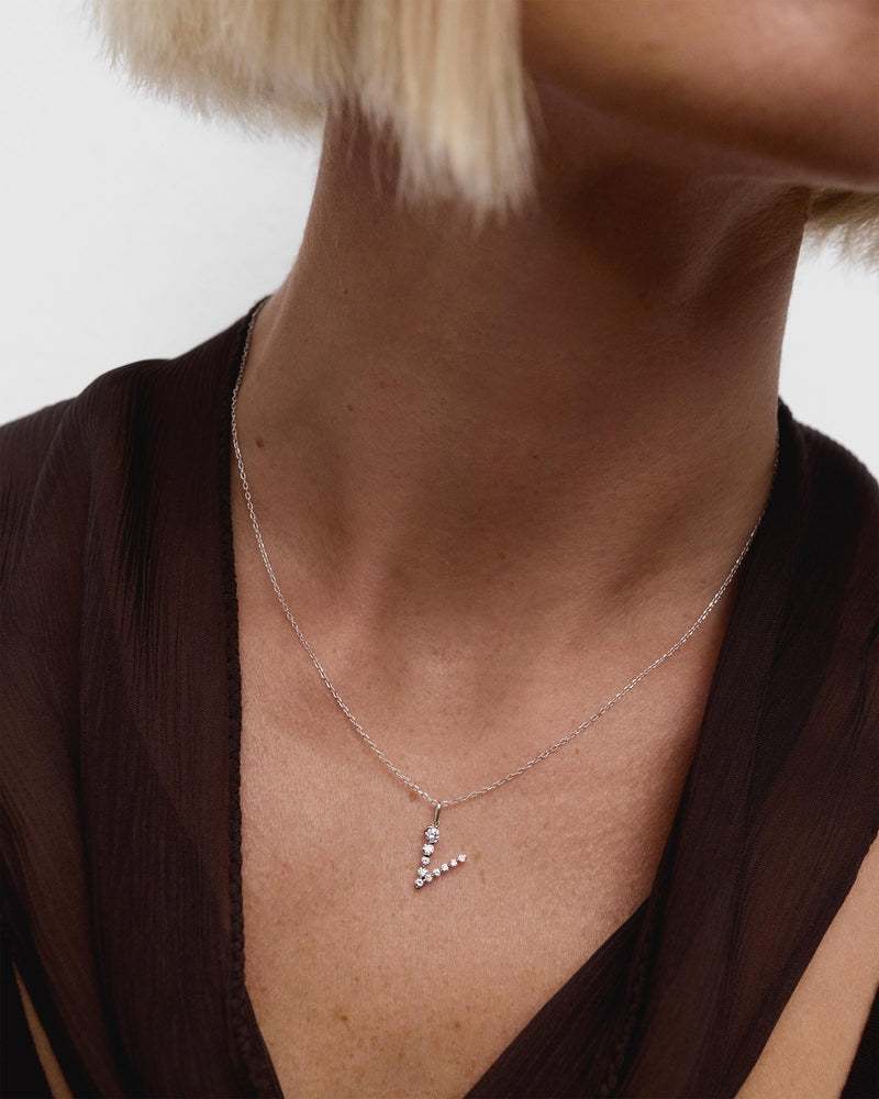 Diamonds and white gold V initial pendant - 
  
    18K White gold / Rhodium silver plating
  

