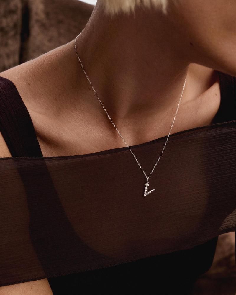 Diamonds and white gold V initial pendant - 
  
    18K White gold / Rhodium silver plating
  
