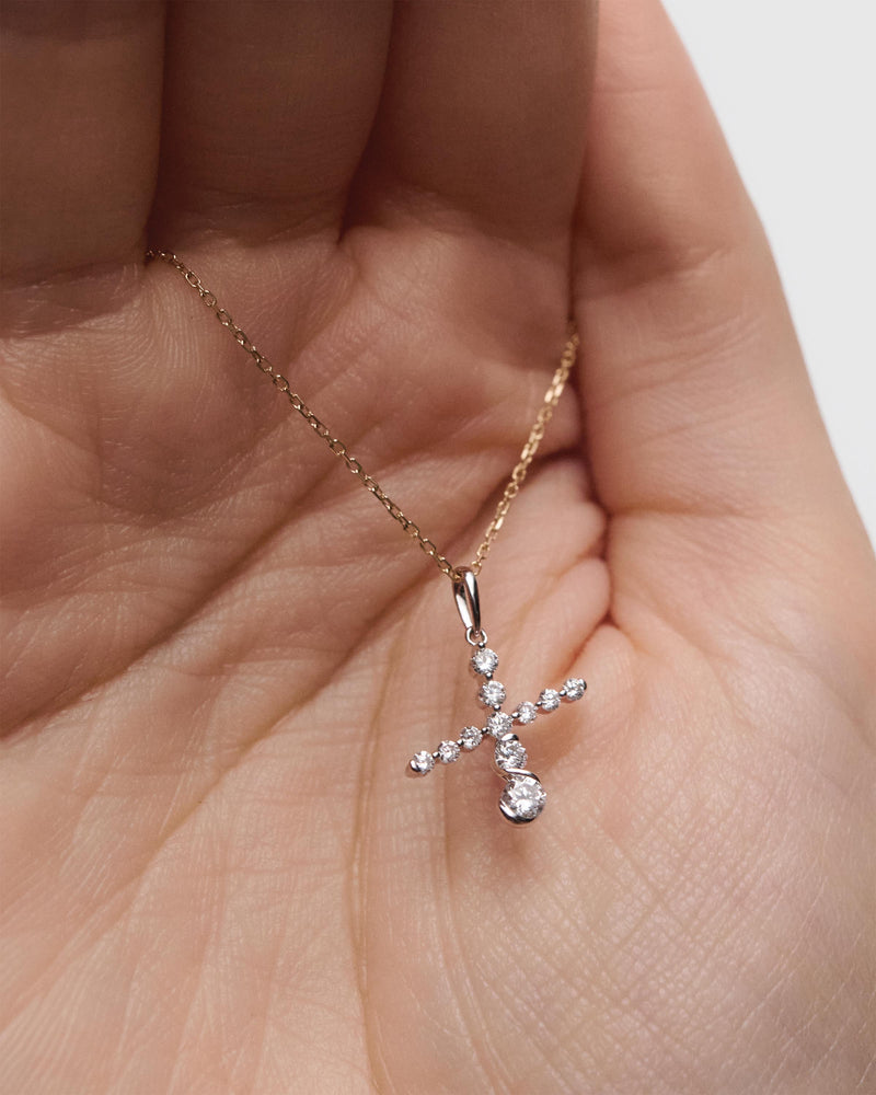 Diamonds and white gold X initial pendant - 
  
    18K White gold / Rhodium silver plating
  
