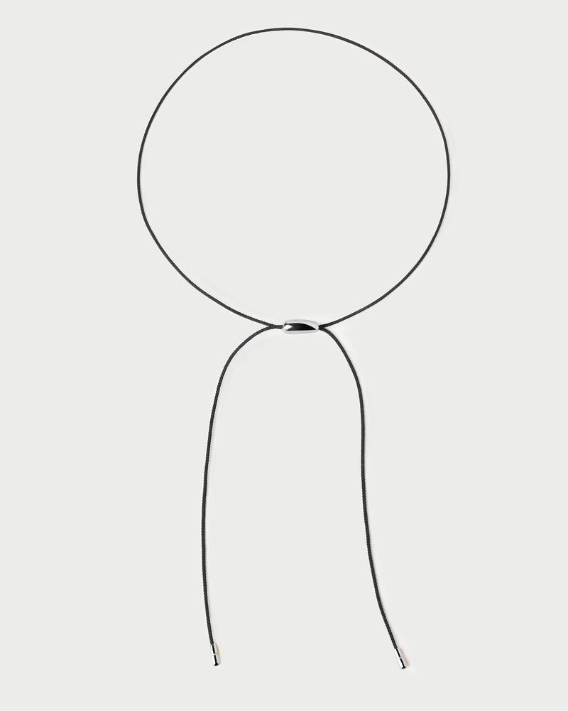 Silver choker necklace with an adjustable black knot cord