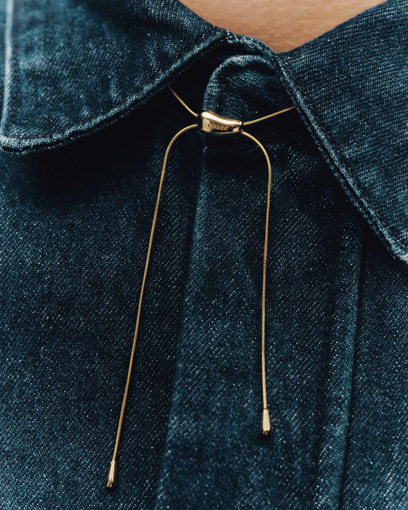 Modern choker necklace with an adjustable drop pendant