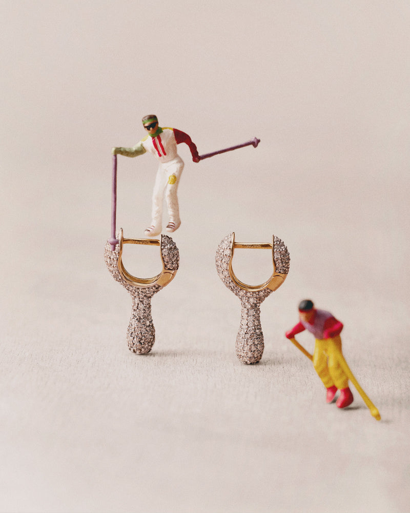 Sleek huggie earrings set with pavé zirconia drop pendant