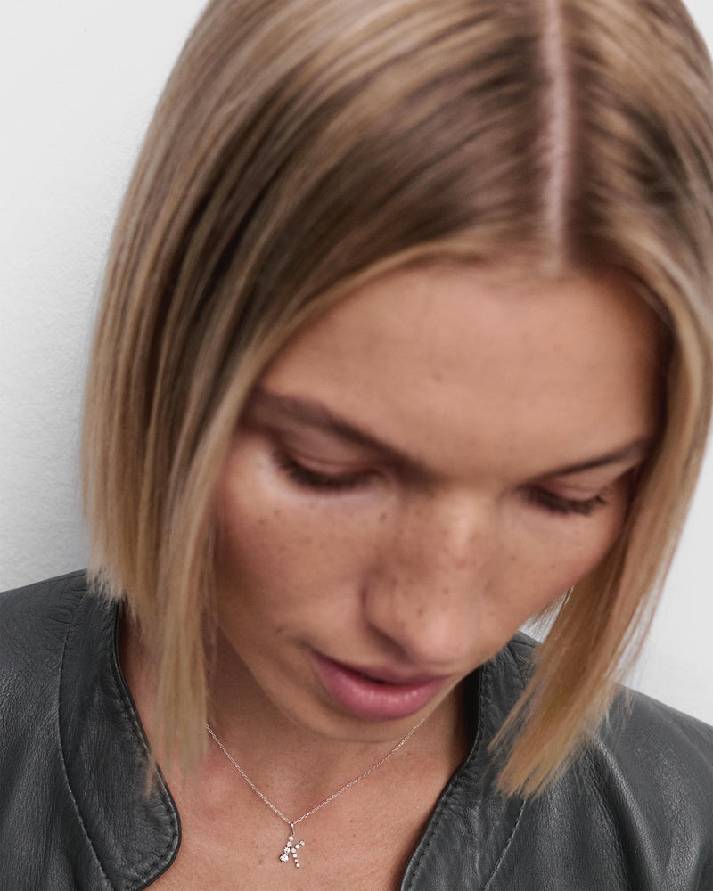 Diamonds and white gold K initial pendant - 
  
    18K White gold / Rhodium silver plating
  
