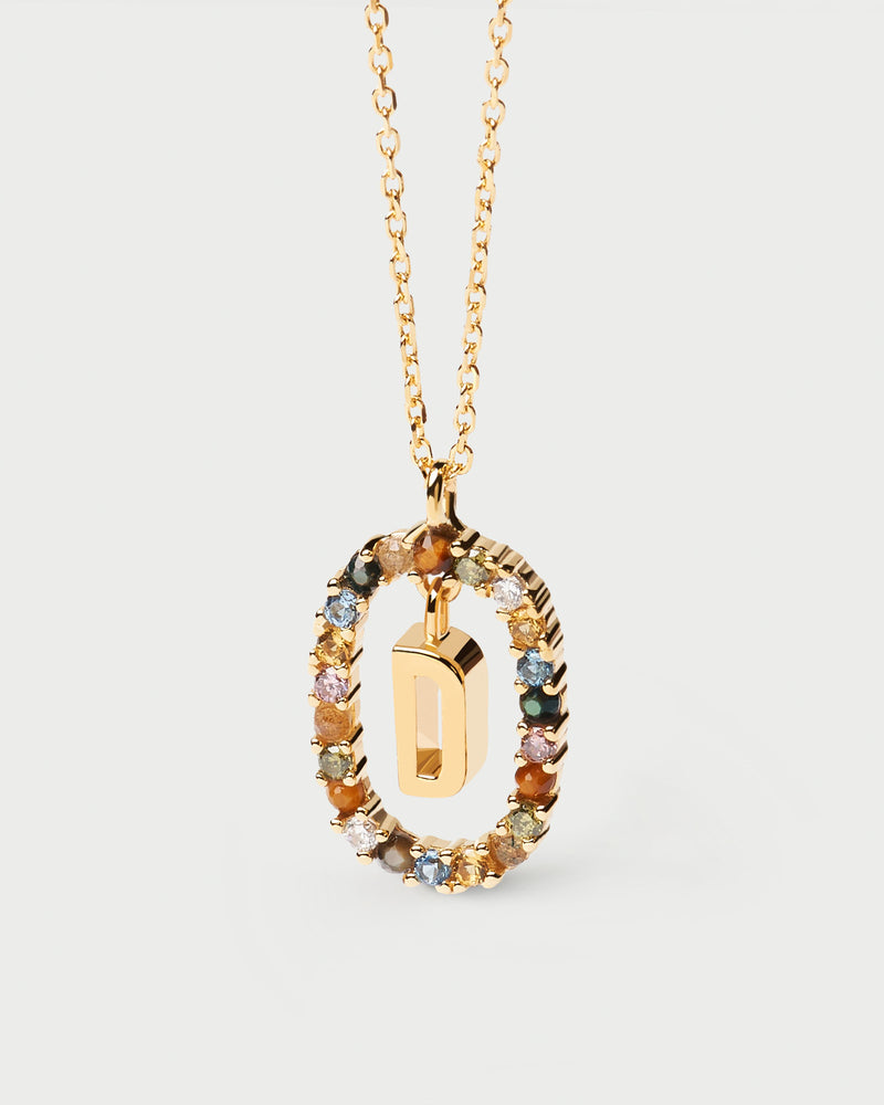 Initial D necklace in gold-plated silver, circled by colorful gemstones