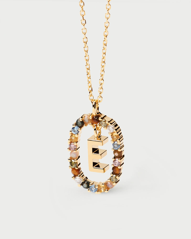 Initial E necklace in gold-plated silver, circled by colorful gemstones