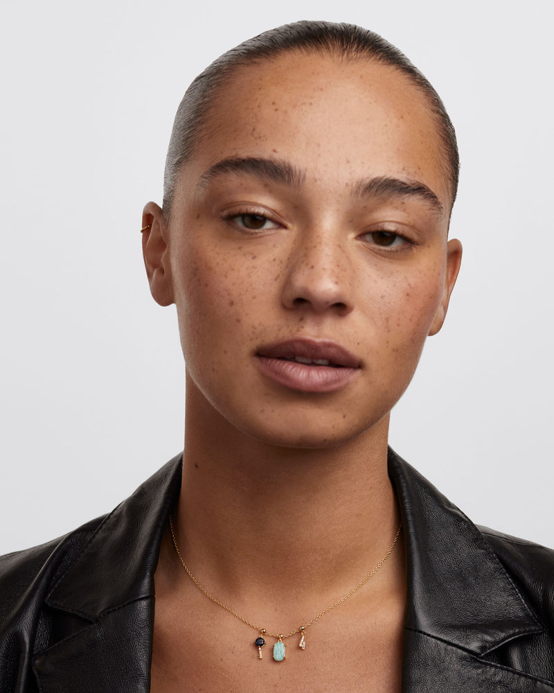 The Key Charm - 
  
    Sterling Silver / 18K Gold plating
  
