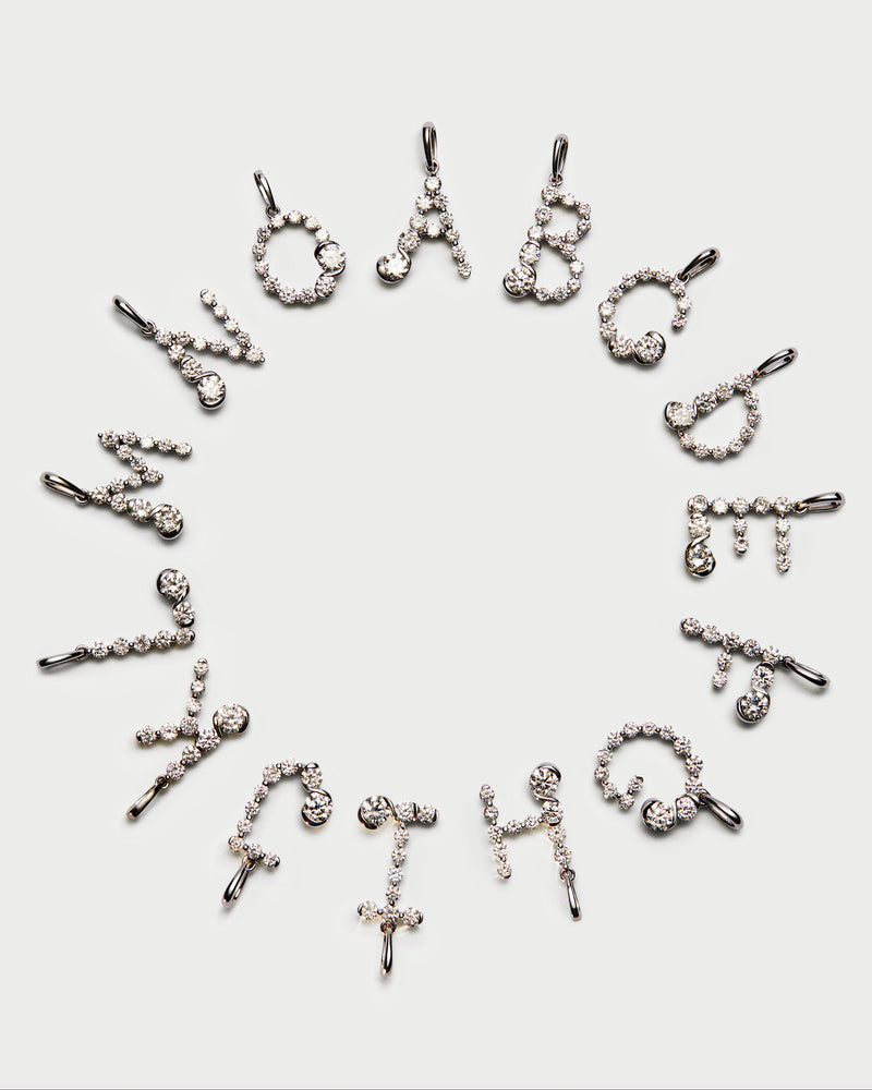 White gold initial S pendant with diamond details