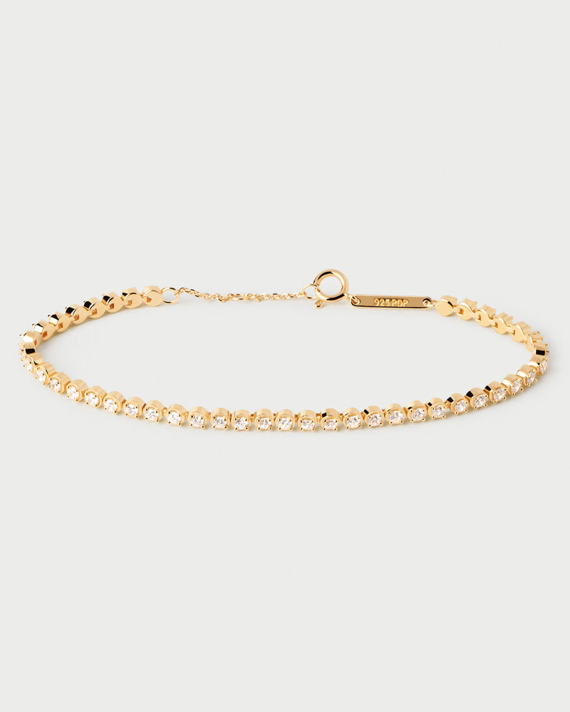 Gold-plated sparkling tennis bracelet set with round cut white zirconia