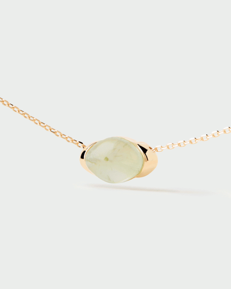 Gold-plated chain necklace with a green oval gemstone motif